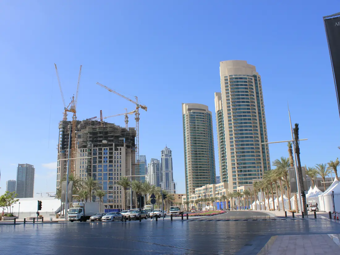 Residential towers on Emaar Boulevard in Downtown Dubai, an example of buying property in Dubai through a company or personally