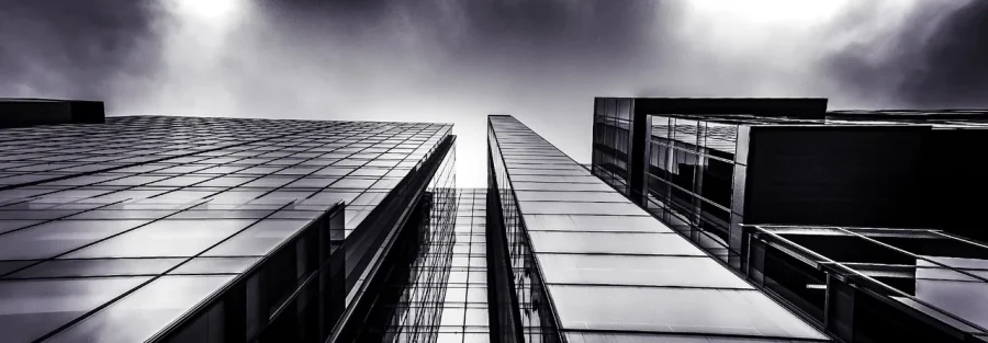 Dubai dual licence: glass office facade representing a free zone company expanding to the mainland