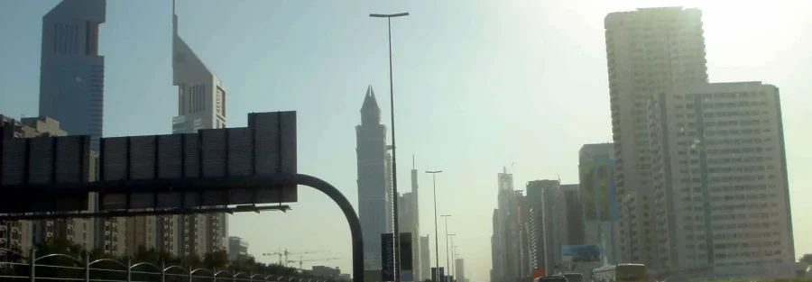 Should you set up a company in Dubai: a view along Sheikh Zayed Road toward the towers