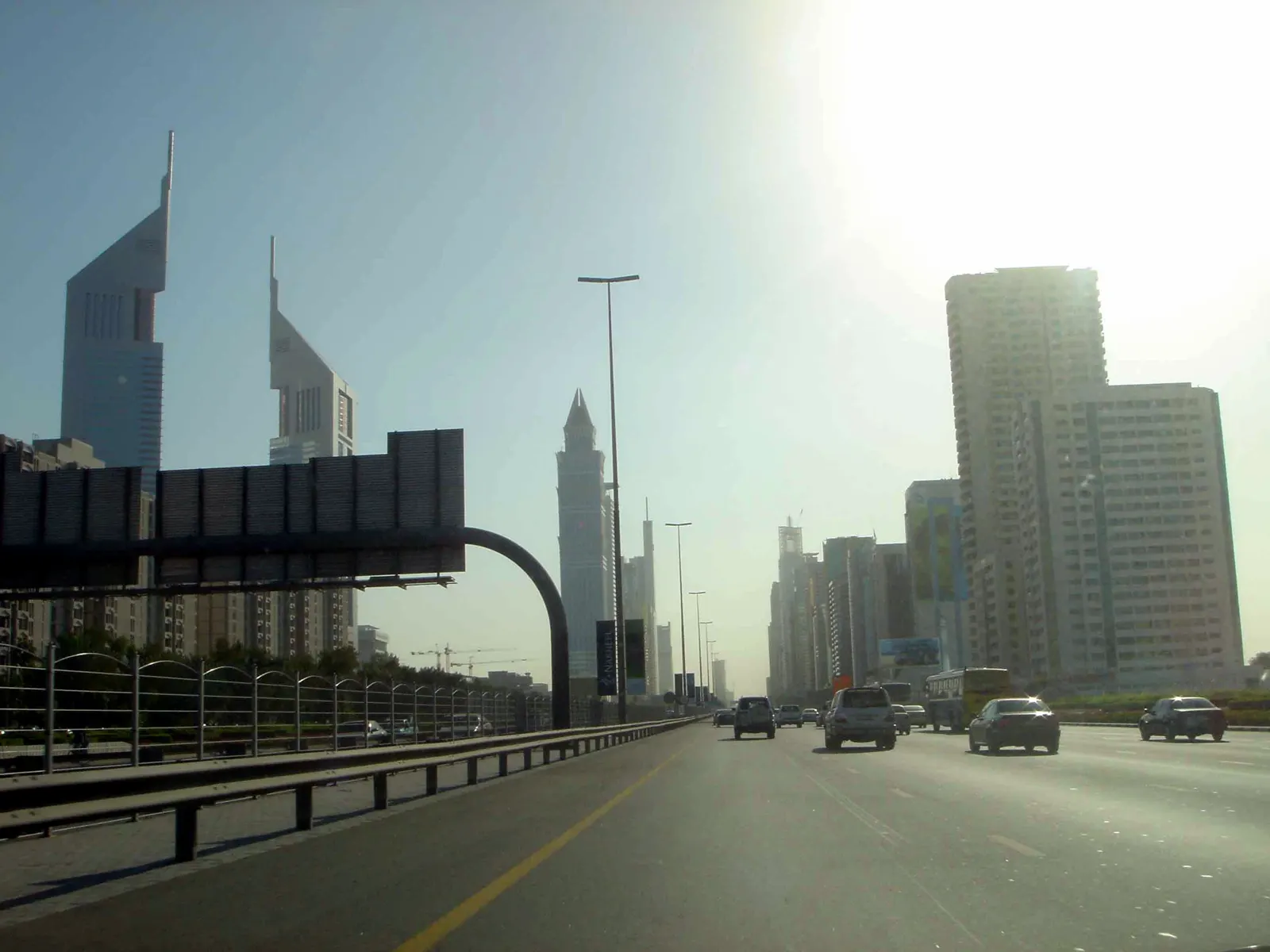 Should you set up a company in Dubai: a view along Sheikh Zayed Road toward the towers