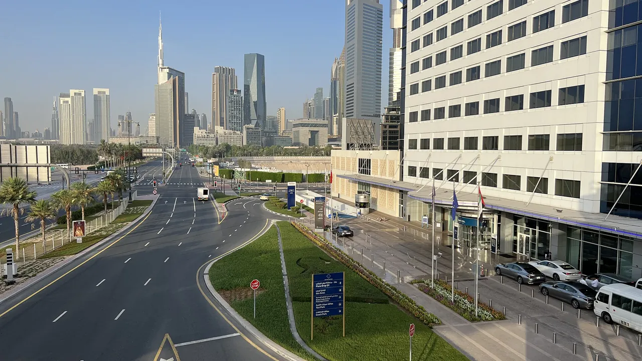 Business district street in Dubai near the World Trade Centre, setting for Emiratisation requirements for UAE employers