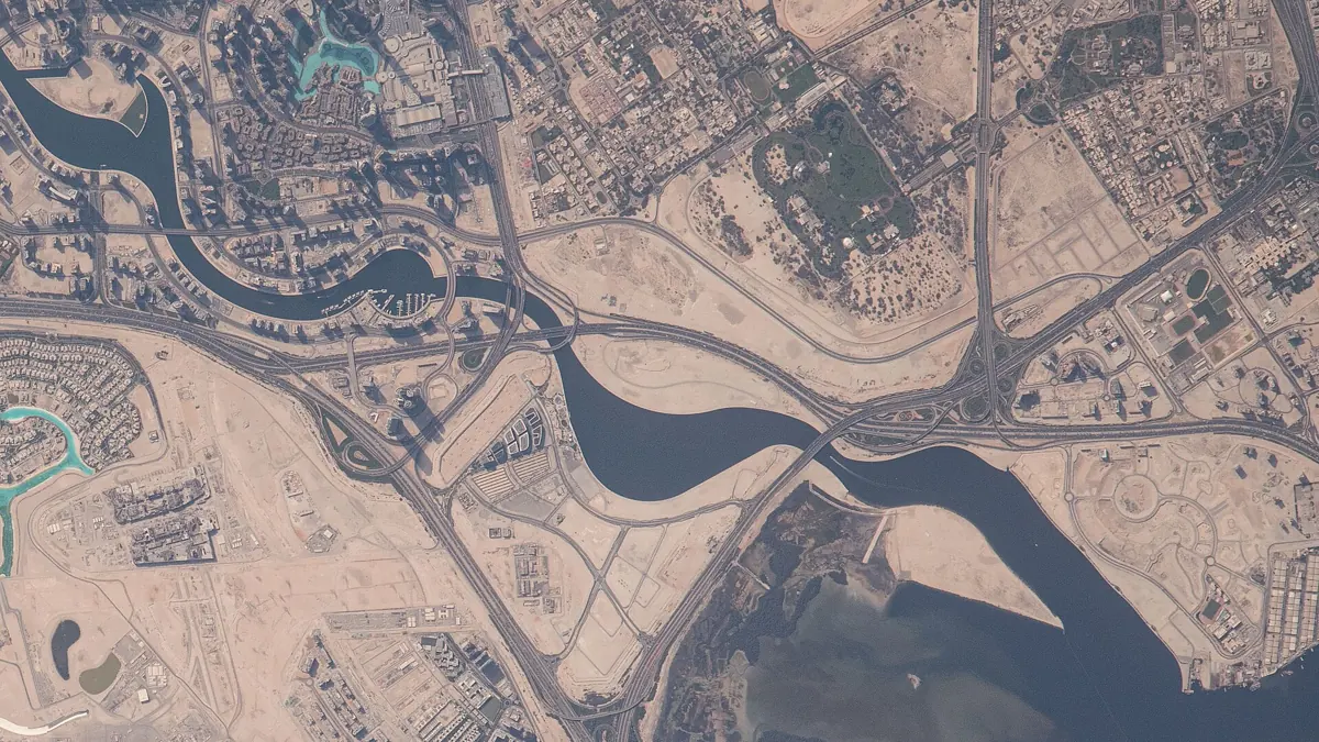 Aerial view of the Dubai Water Canal and Business Bay, where foreign ownership in the UAE shapes company licences
