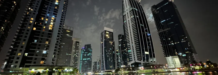Free zone audited accounts UAE: Jumeirah Lakes Towers at night, Dubai