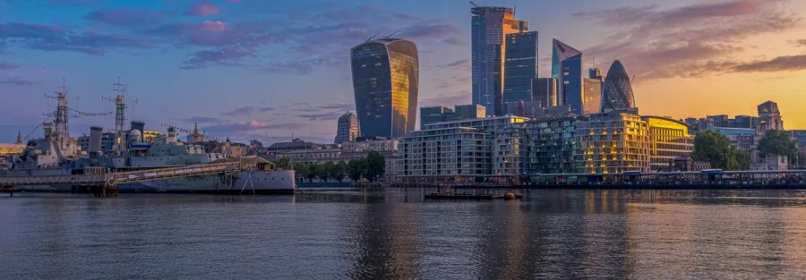 Dubai vs London for entrepreneurs: the City of London skyline at dusk over the River Thames