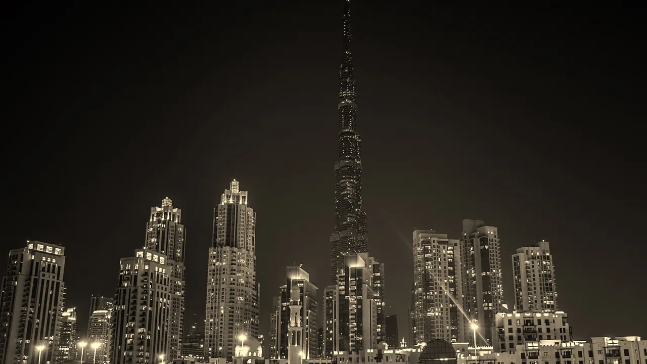 Dubai towers around the Burj Khalifa in sepia, an image for Oqood vs title deed ownership evidence