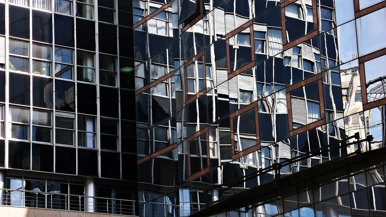 Glass office building where a foreign company could create a permanent establishment UAE tax presence