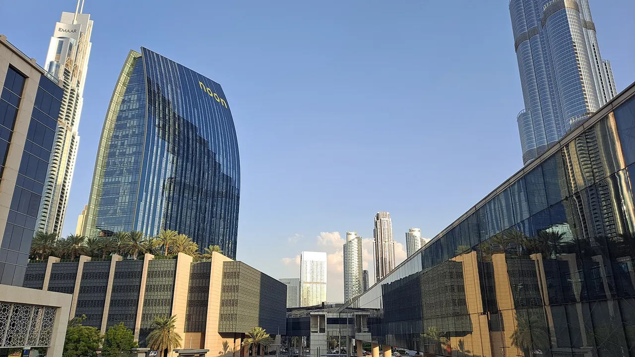 Power of attorney for Dubai property: Downtown Dubai towers and Burj Khalifa in daylight