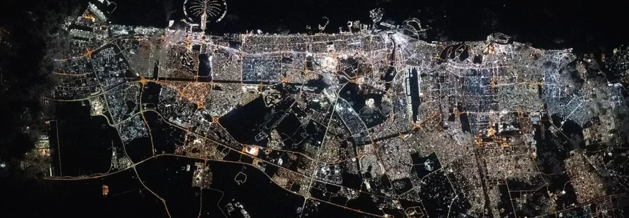 Types of trade licence in Dubai: city lights of Dubai seen at night from space