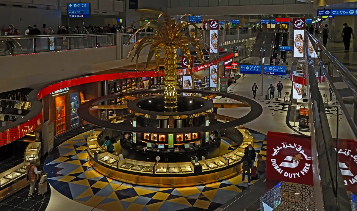 Dubai International Airport Terminal 3 concourse, illustrating running a UAE company from abroad
