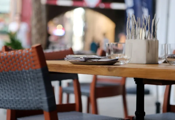 UAE corporate tax deductible expenses restaurant table Restaurant table set for a business meal, the kind of client hospitality that is only 50% deductible in UAE corporate tax deductible expenses