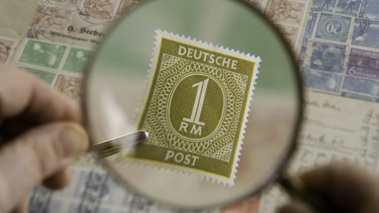 Magnifying glass over a document to review a UAE voluntary disclosure